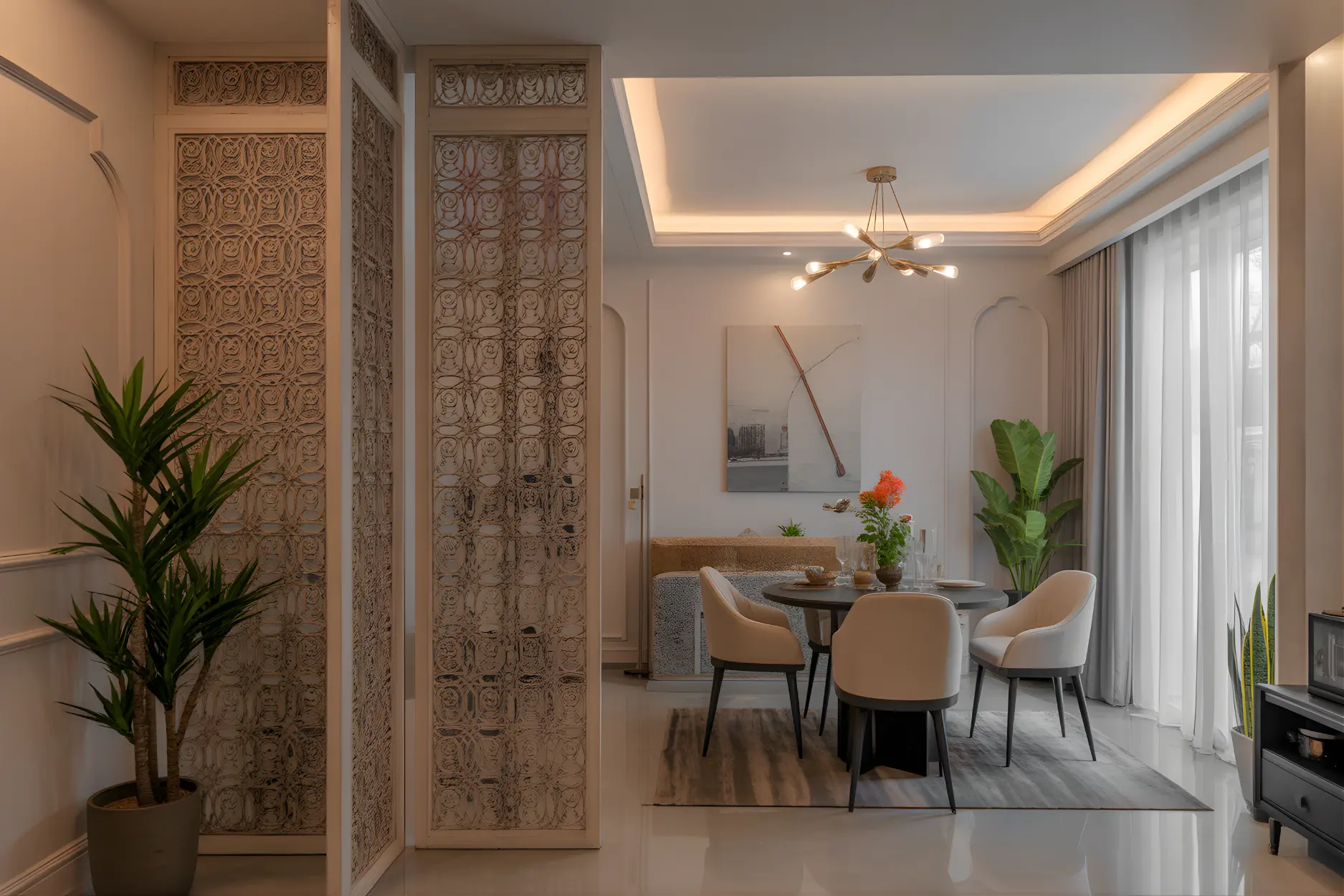 Gold-toned jaali dividing the entryway and living room