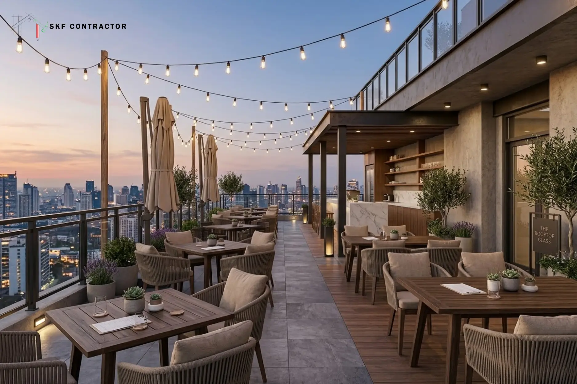 Modern luxury rooftop terrace bar with outdoor seating and string lights overlooking a city skyline at sunset.